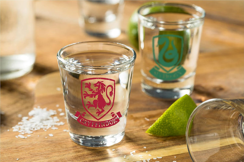 Harry Potter Shot Glass Set - 2 oz. Capacity - Set of 4 Glasses - Gryffindor, Slytherin, Hufflepuff, Ravenclaw