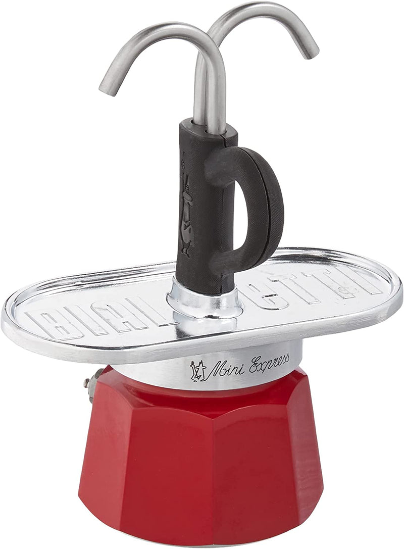 Bialetti - Mini Express Magritte: Moka Set includes Coffee Maker 2-Cup (2.8 Oz) + 2 shot glasses, Red, Aluminium