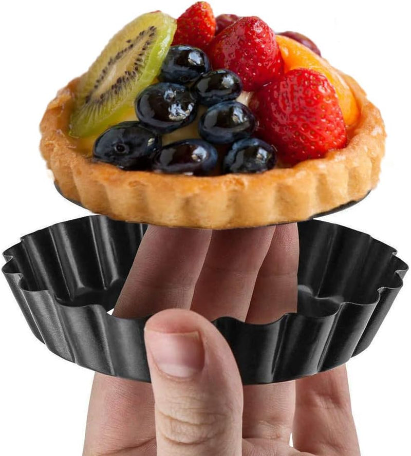 The product title is 8 Pack DATANYA 4 Inch Mini Tart Pans with Removable Bottom - Nonstick Quiche Pan for Dessert Baking