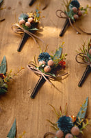 Boutonnieres for Guests in Dark Teal & Burnt Orange