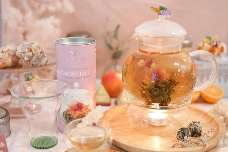 Teabloom Wings of Love Blooming Tea Gift Set - 40 oz Borosilicate Glass Teapot, Teapot Warmer, Glass Loose Tea Infuser, 12 Fruit Flowering Tea Canister