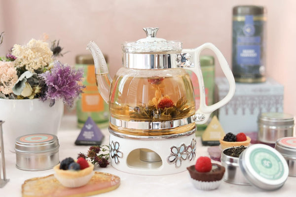 Teabloom Princess of Monaco Teapot & Blooming Tea Gift Set (6 Pieces) - Borosilicate Glass Teapot (34 oz / 1000 ml / 3-4 Cups), Porcelain Lid, Tea Warmer + Candle, Loose Tea Infuser, 2 Flowering Teas